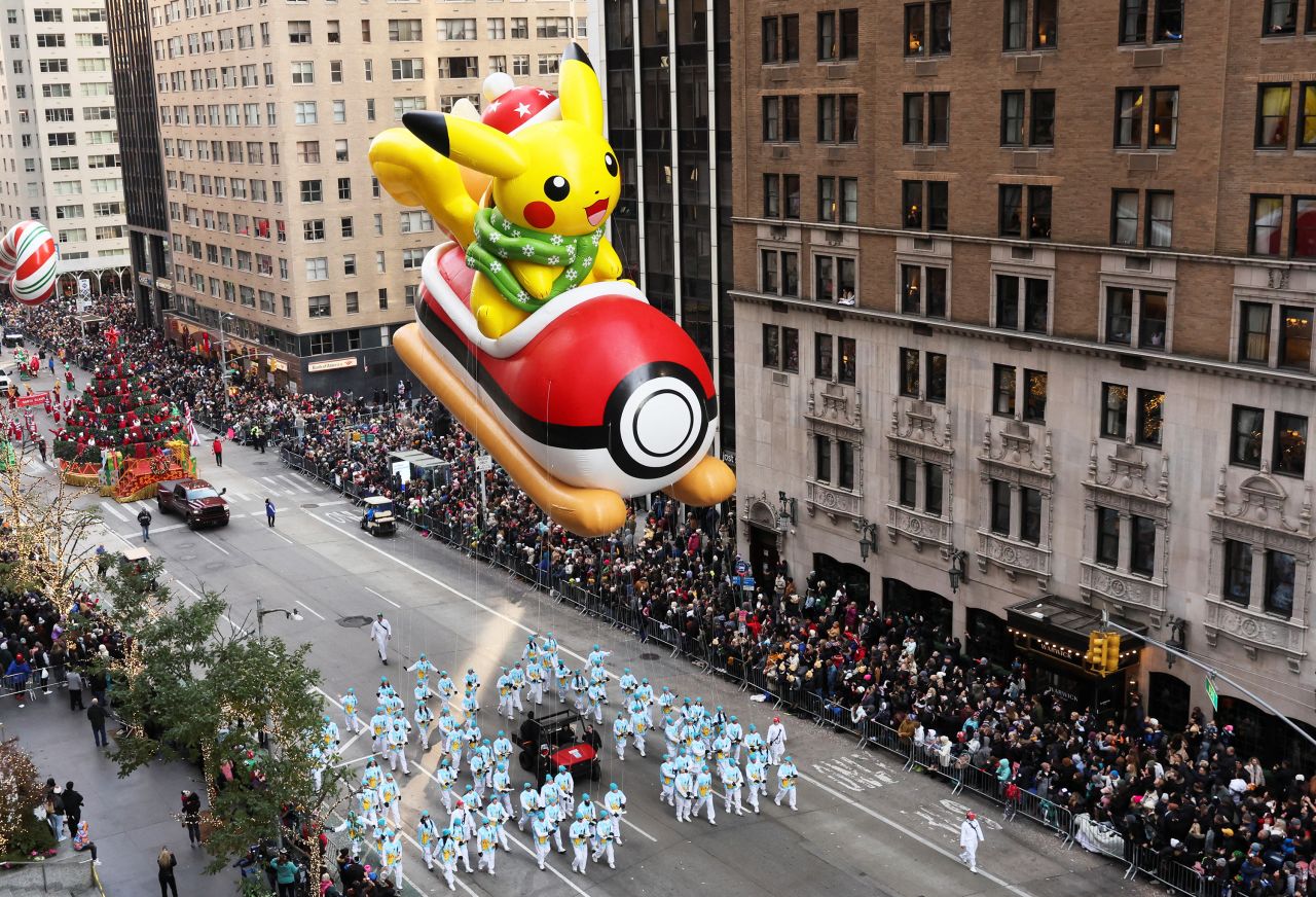 A Pikachu balloon floats in New York City during the annual Macy's Thanksgiving Day Parade on Thursday, November 24. <a href=