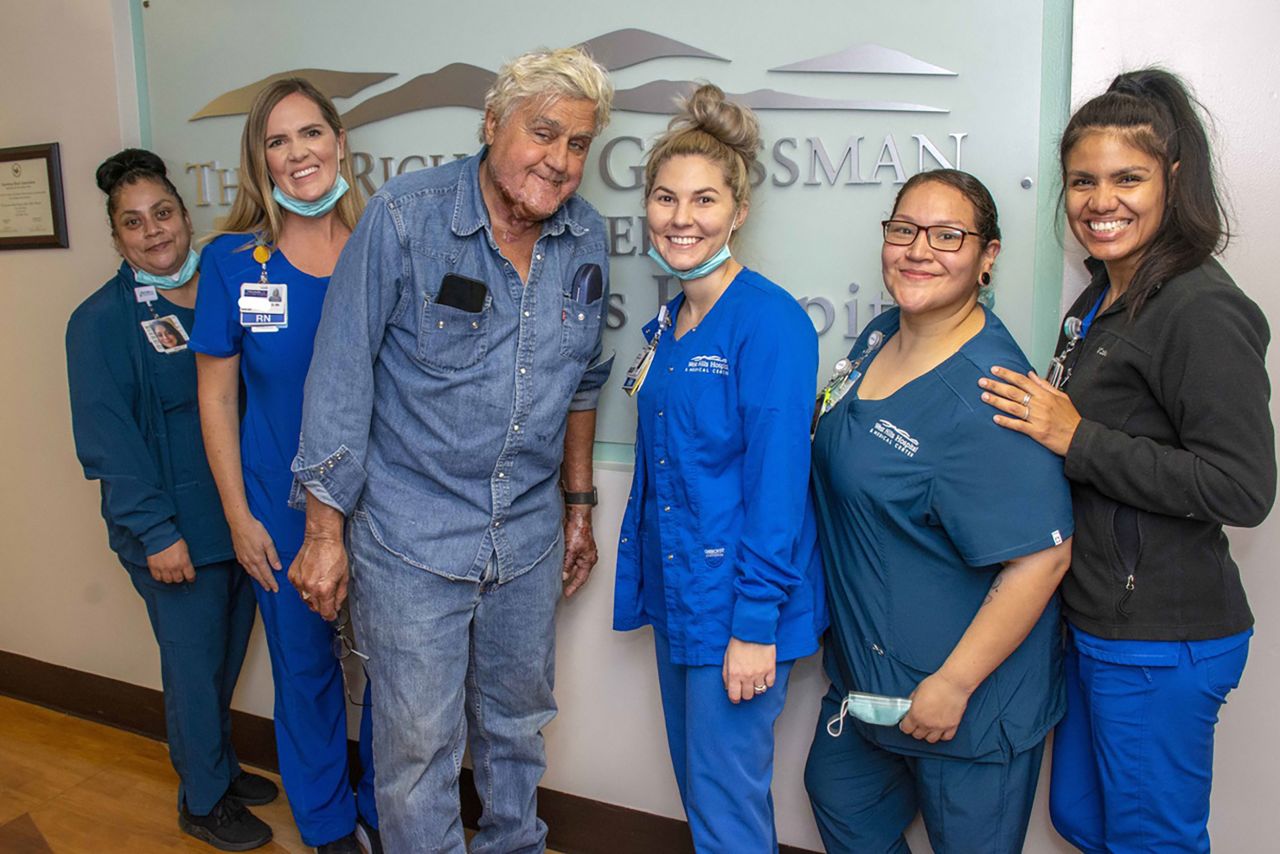Comedian Jay Leno poses with members of the Grossman Burn Center after <a href=