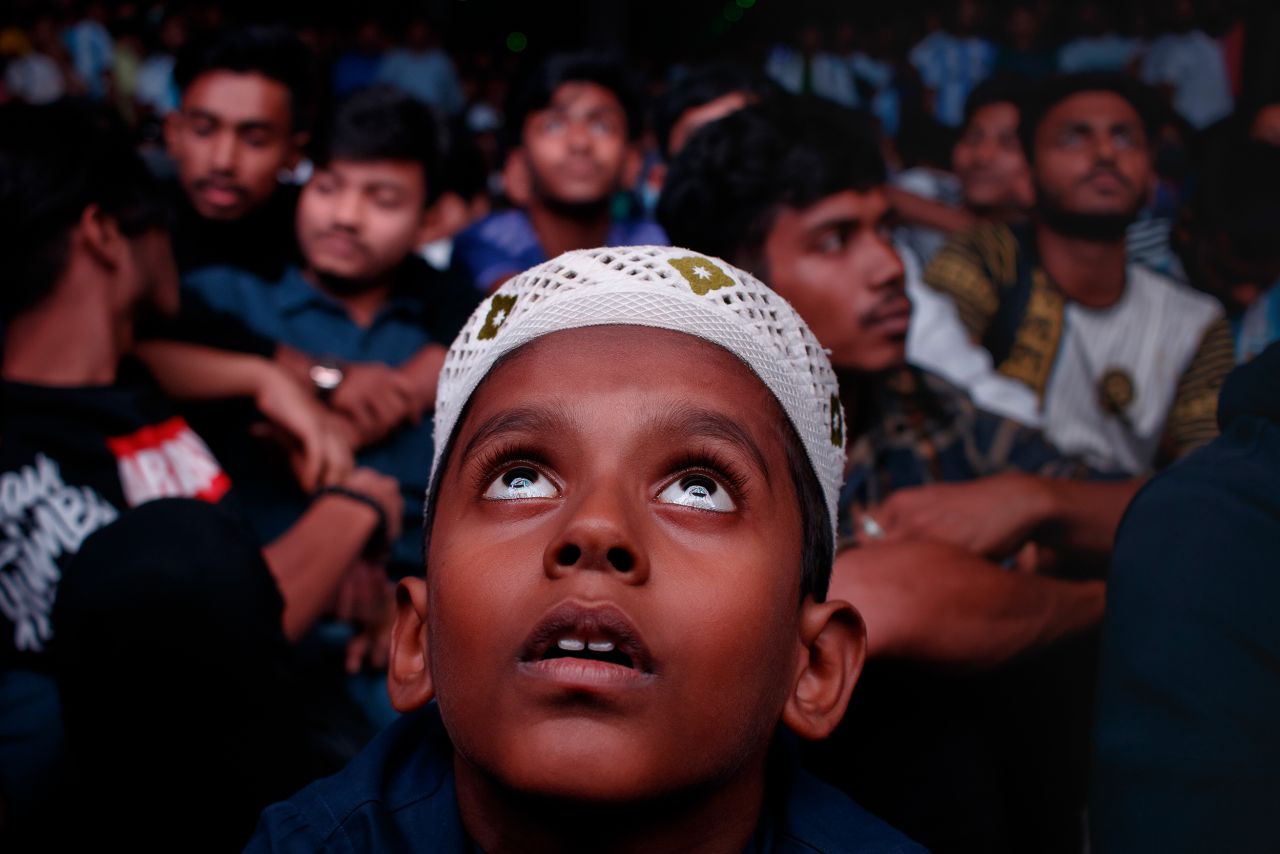 A boy watches a World Cup match on a big screen in Dhaka, Bangladesh, on Tuesday, November 22.