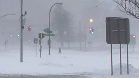 High winds and snow covers the streets and vehicles in Buffalo, on Sunday, December 25, 2022. 