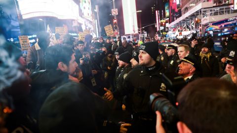 Police officers and protesters clash in New York on January 27. 
