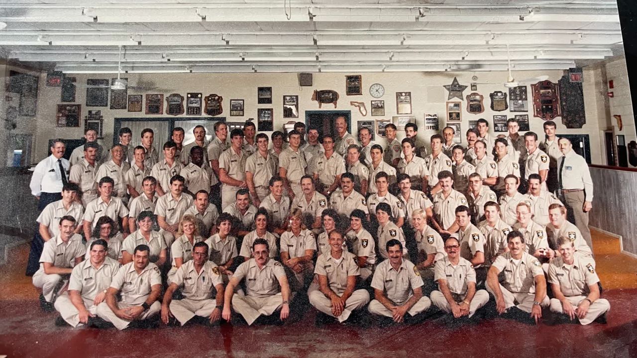 Calkins (front row, second from right) completed his police academy training in 1987.