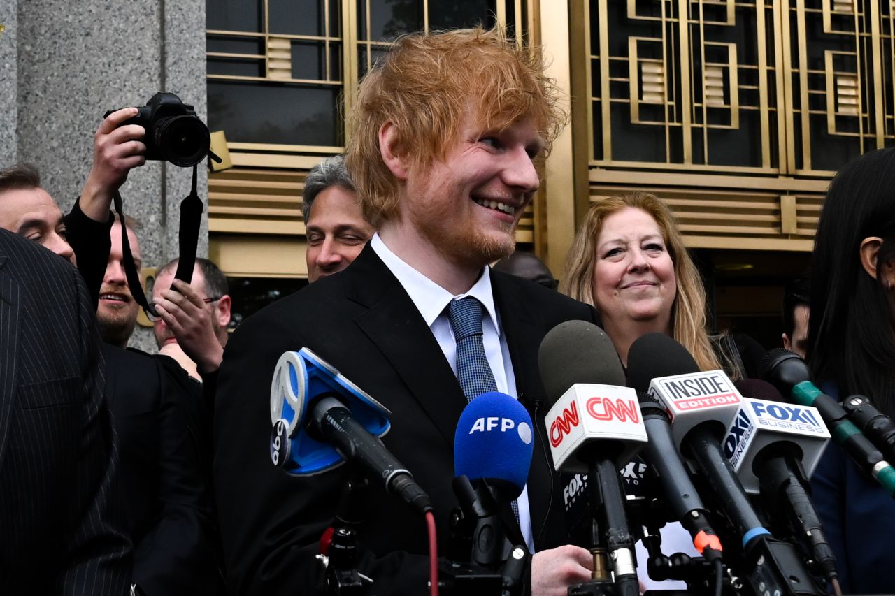 Singer Ed Sheeran talks to the media in New York on Thursday, May 4, after a jury found that his hit 