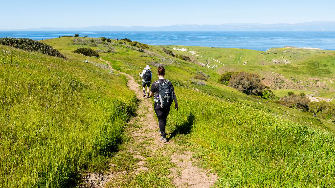 Hikers make their way along Scorpion Canyon Loop trail on Santa Cruz Island in Channel Islands National Park.