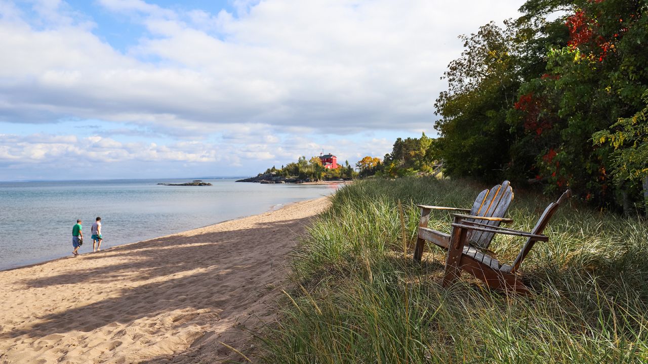 The shores of Lake Superior in Marquette, Michigan, with Harbor Lighthouse in the background.