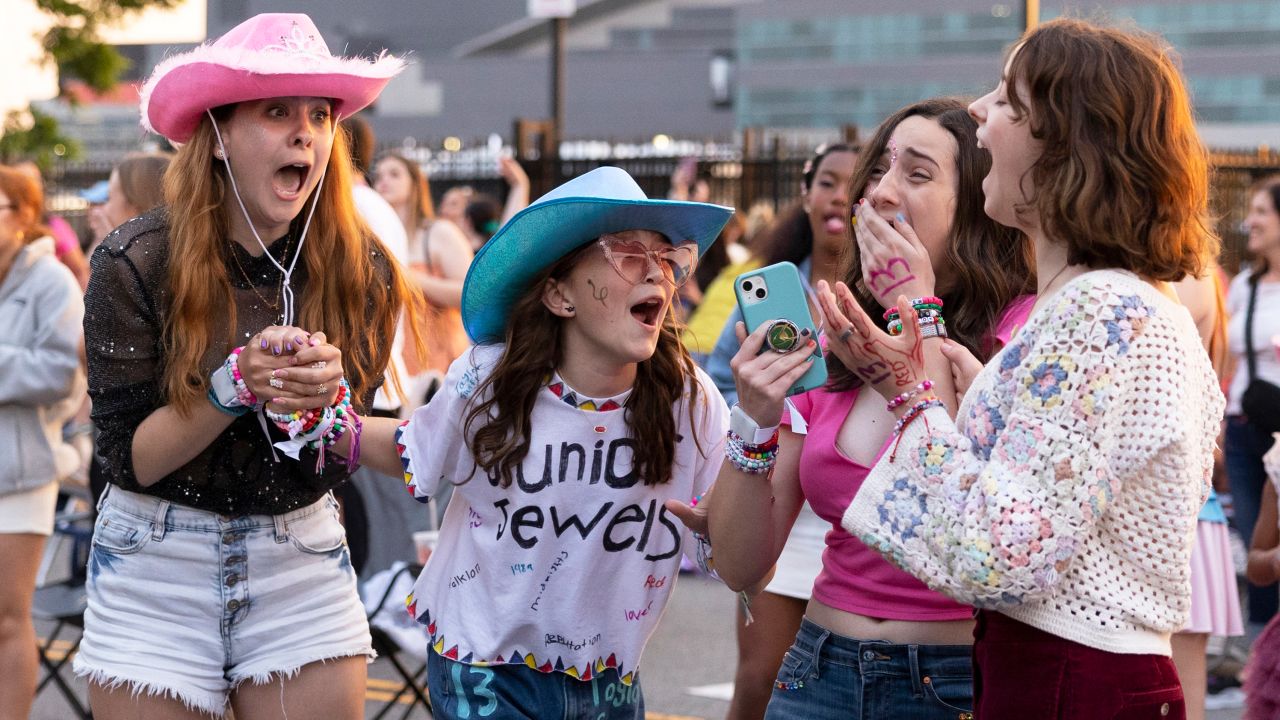 Swifies react to hearing Taylor Swift's 'Eras Tour' set begin from the parking lot of Philadelphia's Lincoln Financial Field in May. 