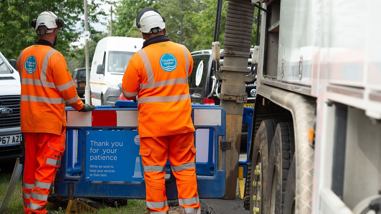 Thames Water employees fixing leaking pipes in Windsor, UK on July 5, 2023.