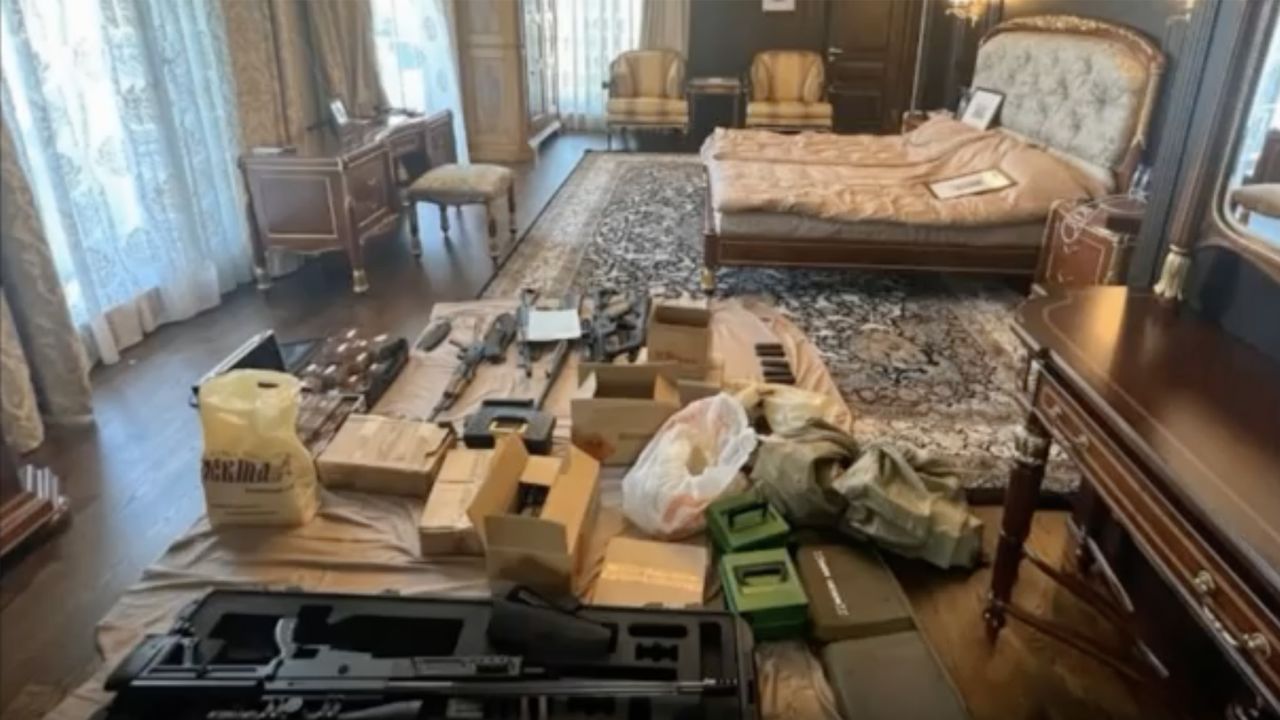 Weapons and ammunition reportedly found during the raid.