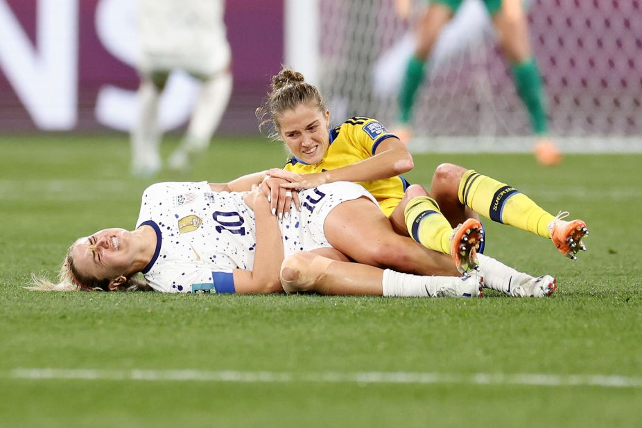 US midfielder Lindsey Horan grimaces in pain after a collision.