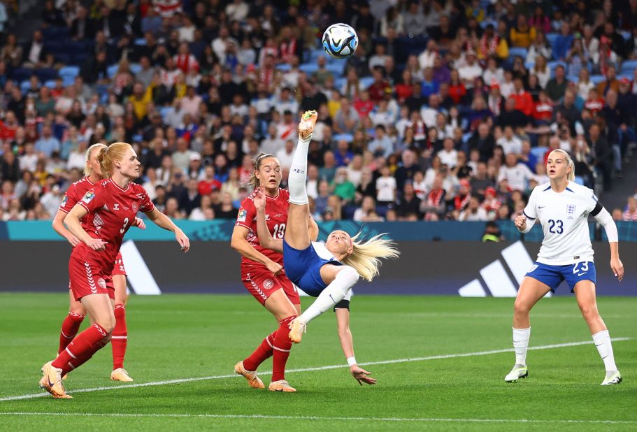 England's Chloe Kelly attempts a bicycle kick versus Denmark on July 28. <a href=