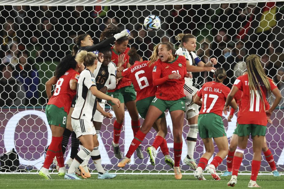 Moroccan goalkeeper Khadija Er-Rmichi tries to punch the ball away during a match against Germany on July 24. <a href=
