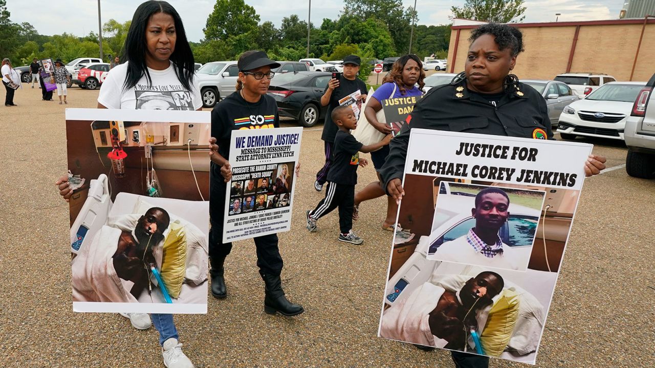 Activists march towards the Rankin County Sheriff's Office in Brandon, Mississippi, on Wednesday, July 5, 2023, after five former deputies and one former Richland police officer were accused of assaulting two Black men.