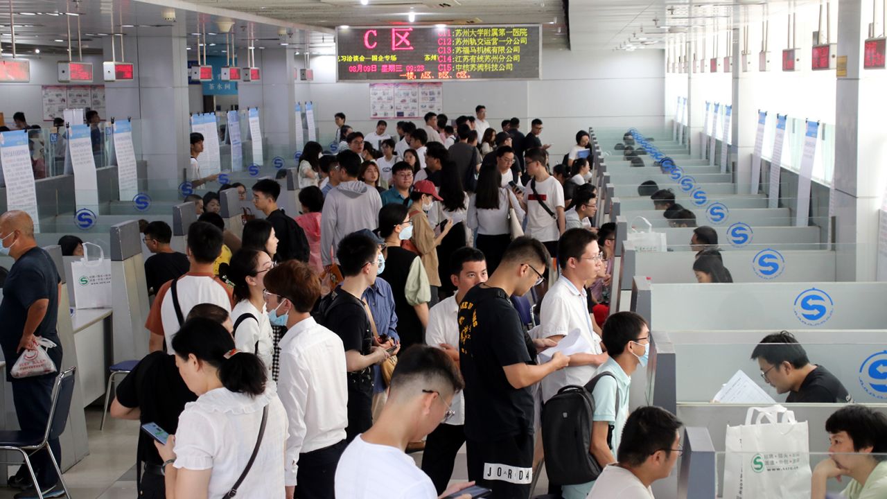 Students and graduates at a college job and internship fair in Suqian, China, on August 9, 2023. 