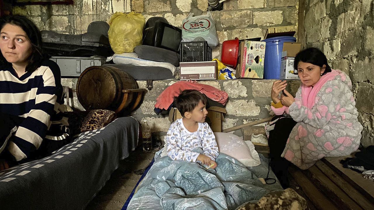 Children sheltered during Azerbaijan's shelling of Stepanakert overnight Tuesday.