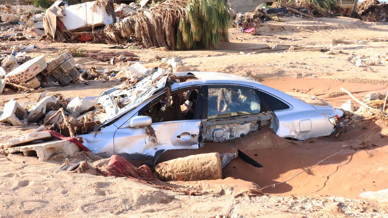 A damaged vehicle is stuck debris after the floods caused by the Storm Daniel in Derna, Libya on September 12, 2023.