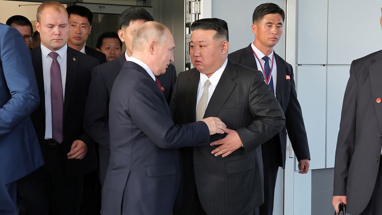 North Korean leader Kim Jong Un and Russia's President Vladimir Putin talk during a tour, in Russia, on September 13.