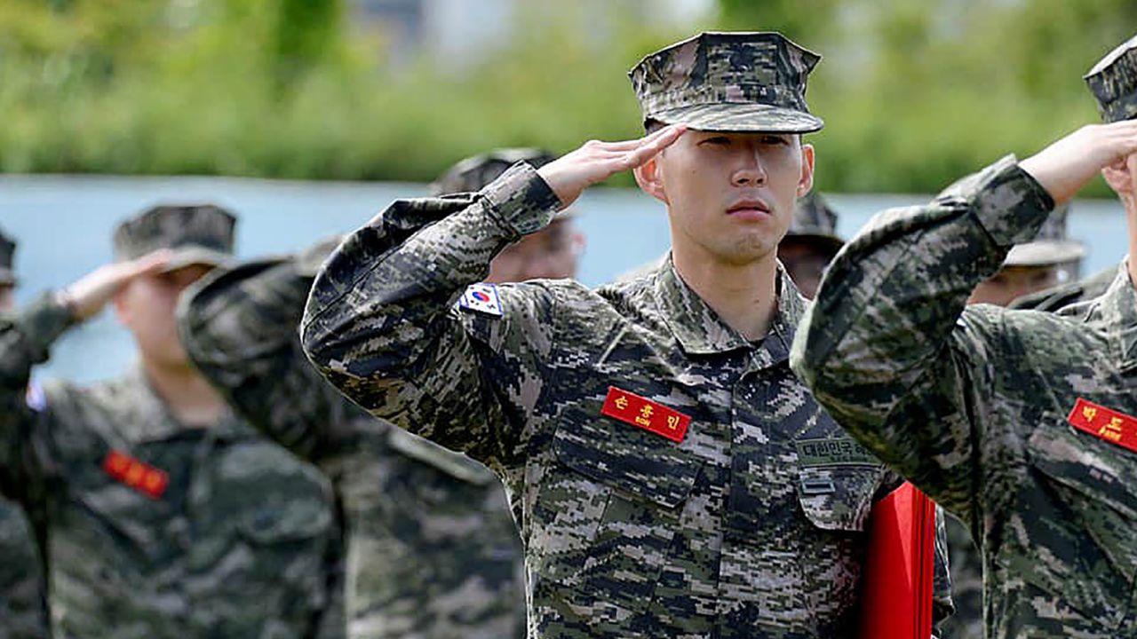 Tottenham Hotspur forward Son Heung-min salutes during the completion ceremony at a Marine Corps boot camp in Seogwipo, Jeju, South Korea.