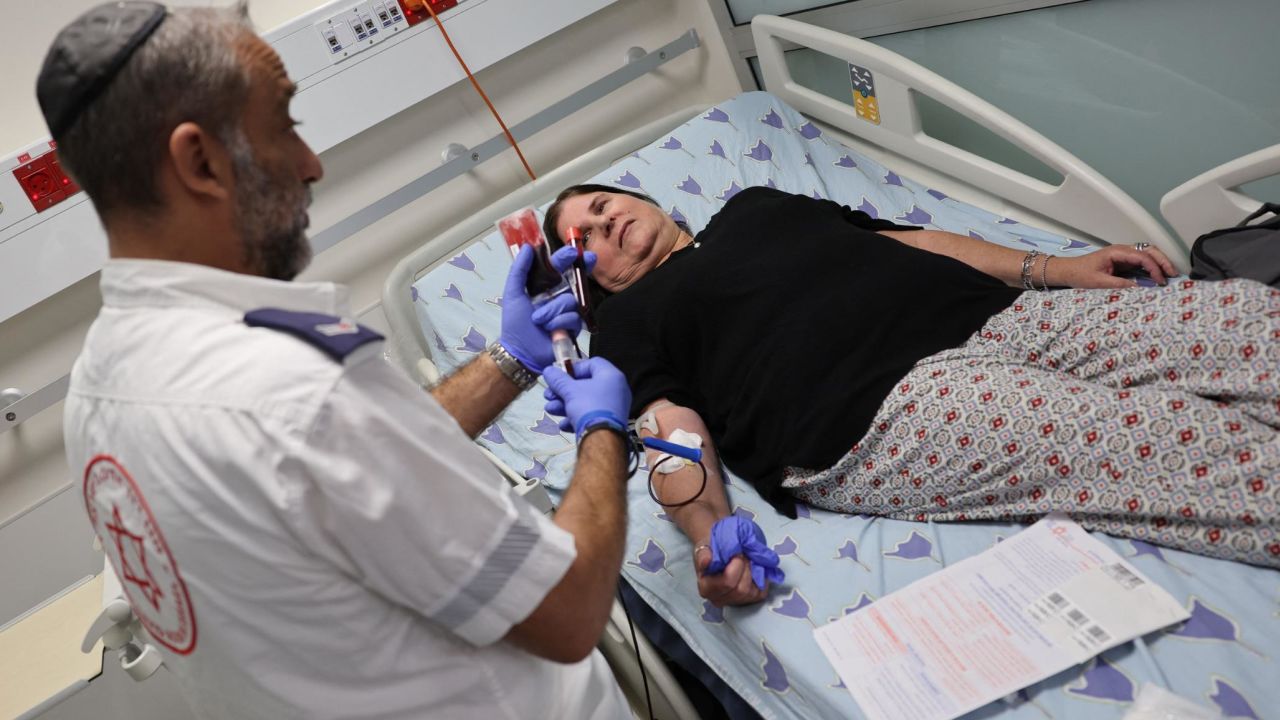 An Israeli woman donates blood at a hospital in Tel Aviv.