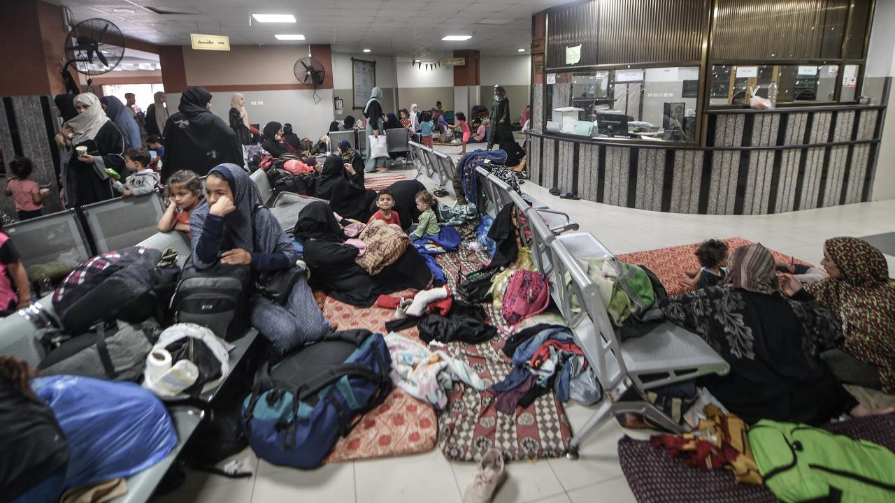 People take refuge in Nasser Hospital, in Khan Younis, in Gaza, after Israeli strikes destroyed their homes, on Monday.