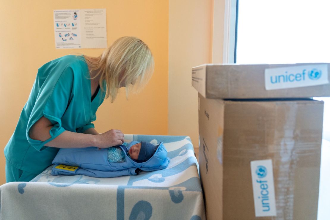 Embrace Global donated its incubators to hospitals in Ukraine, including to the Sumy Regional Perinatal center in Northeastern Ukraine in 2022. Seen here is a nurse at Sumy Perinatal center secures an infant into an Embrace incubator.