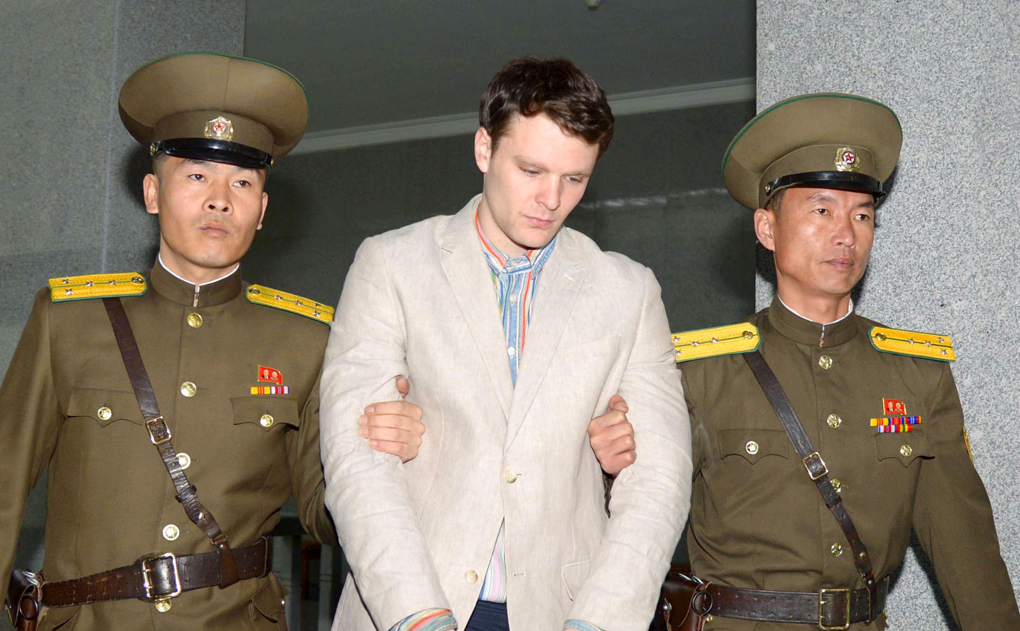 Otto Warmbier is taken to North Korea's top court in Pyongyang, in this photo released by Kyodo on March 16, 2016.
